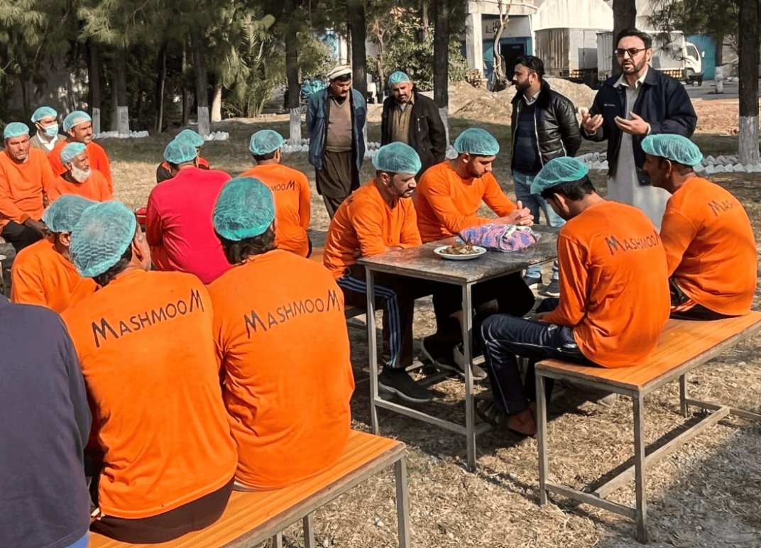 Workers gathered in an industrial estate